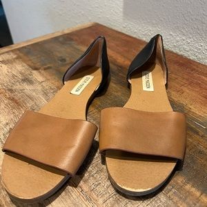 Black and brown Steve Madden flats